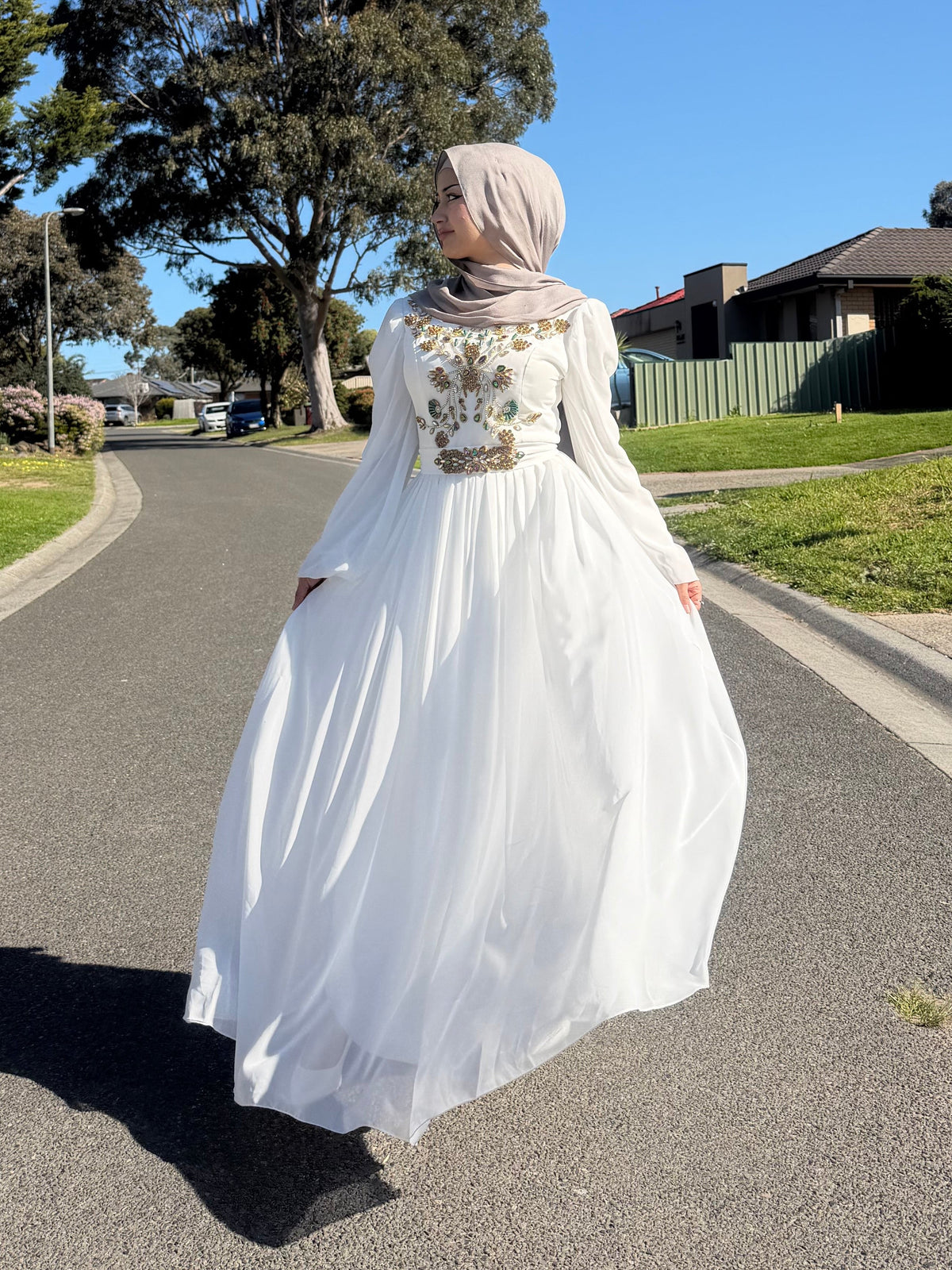 Ivory Jewel Embellished
Gown