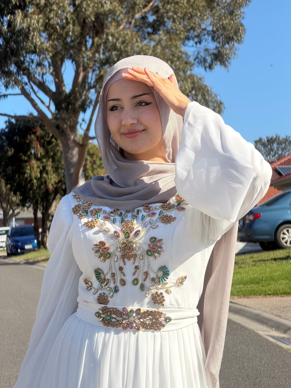 Ivory Jewel Embellished
Gown